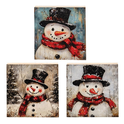 Three assorted distressed wooden snowman block designs with black top hats and red scarves