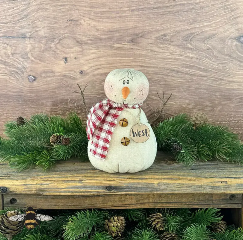 West snowman figurine with red plaid scarf, twig arms, and rustic buttons